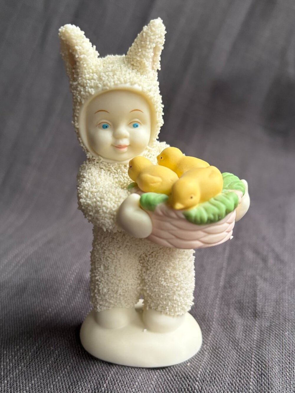 Dept 56 Snowbunnies Figurine in Bunny Suit Holding Basket of chicks